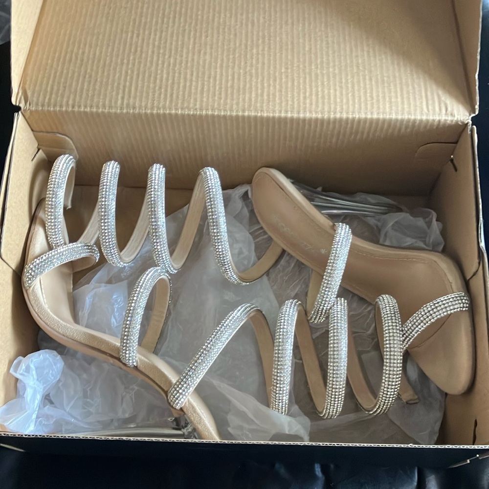 Gorgeous sandal style heels with wrap around leg